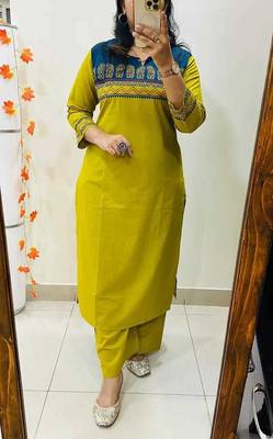 Floral embroidered yellow round neck cotton kurta set with trouser 1