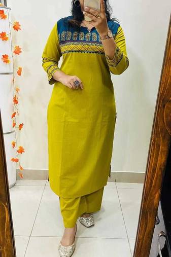 Floral embroidered yellow round neck cotton kurta set with trouser