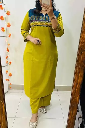 Floral embroidered yellow round neck cotton kurta set with trouser