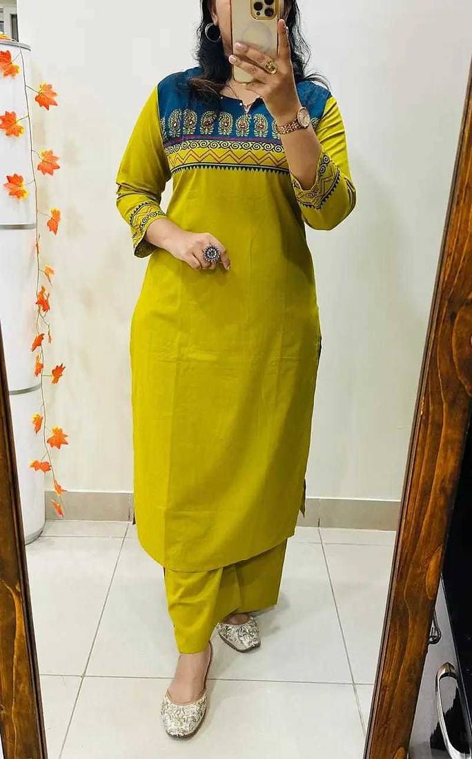 Floral embroidered yellow round neck cotton kurta set with trouser