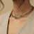 Nvr women's gold plated knot choker necklace
