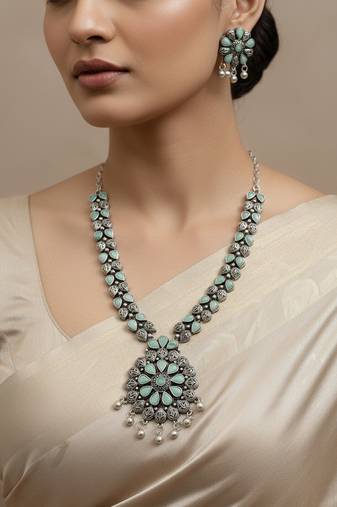 Nvr women oxidised silver finish necklace & earrings set with light blue stones