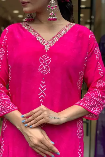 Pink french crepe v-neck kurta with sequin and stone embroidery printed chinon dupatta for elegant festive wear.