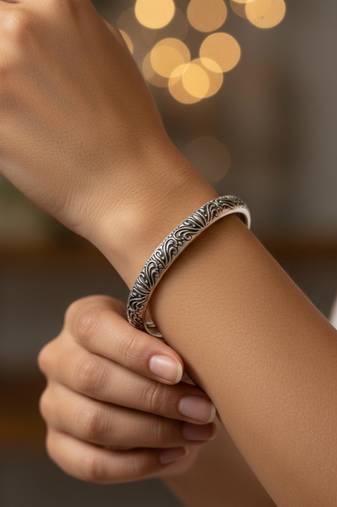 Nvr women oxidized silver plated paisley & floral carved kada bangle