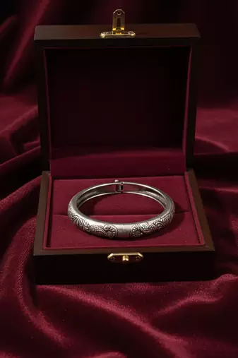 Nvr women oxidized silver plated paisley & floral carved kada bangle