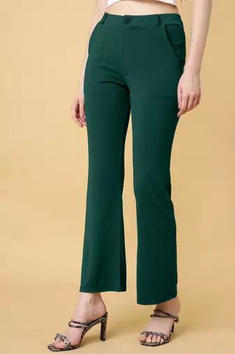 Women solid green regular fit mid-rise flat front trousers