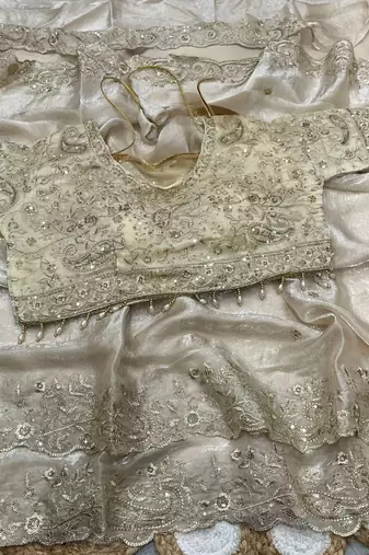 White Color Embroidery sequence work heavy border Satin Saree