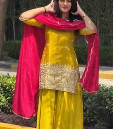 Yellow kurta sharara set with pink dupatta