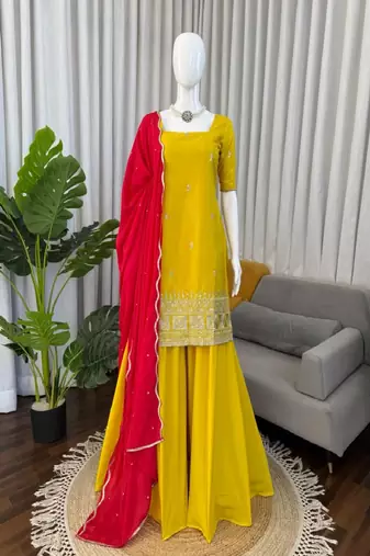 Yellow kurta sharara set with pink dupatta