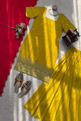 Yellow kurta sharara set with pink dupatta 4