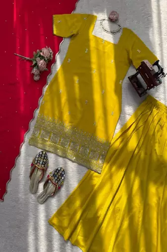 Yellow kurta sharara set with pink dupatta