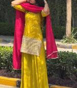 Yellow kurta sharara set with pink dupatta