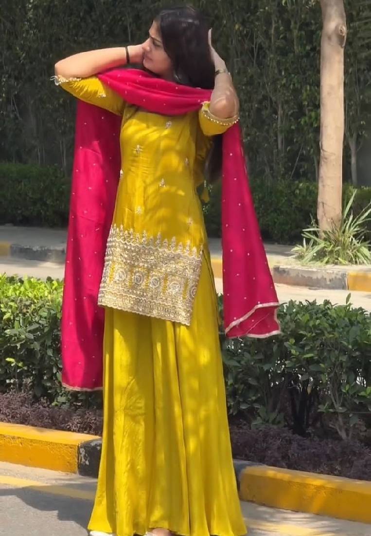 Yellow kurta sharara set with pink dupatta