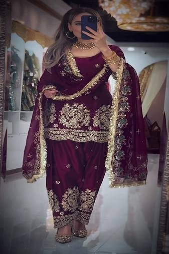 Purple heavy embroidered festive suit