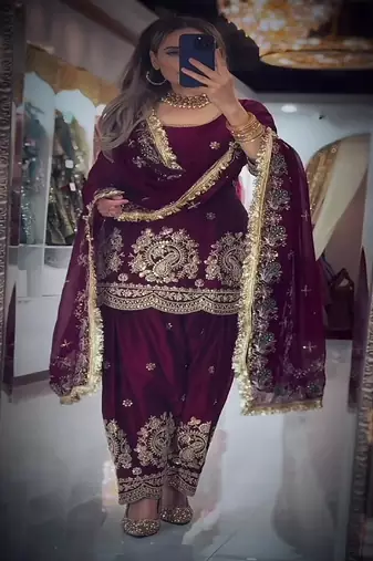 Purple heavy embroidered festive suit