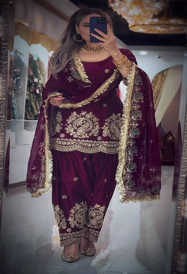 Purple heavy embroidered festive suit