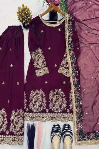 Purple heavy embroidered festive suit