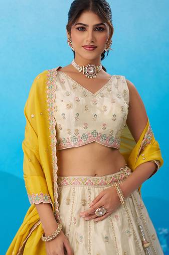 Cream- Tissue Sequins Embroidered Semi-Stitched Lehenga & Unstitched Blouse With Dupatta
