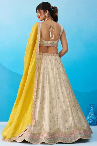 Cream- Tissue Sequins Embroidered Semi-Stitched Lehenga & Unstitched Blouse With Dupatta