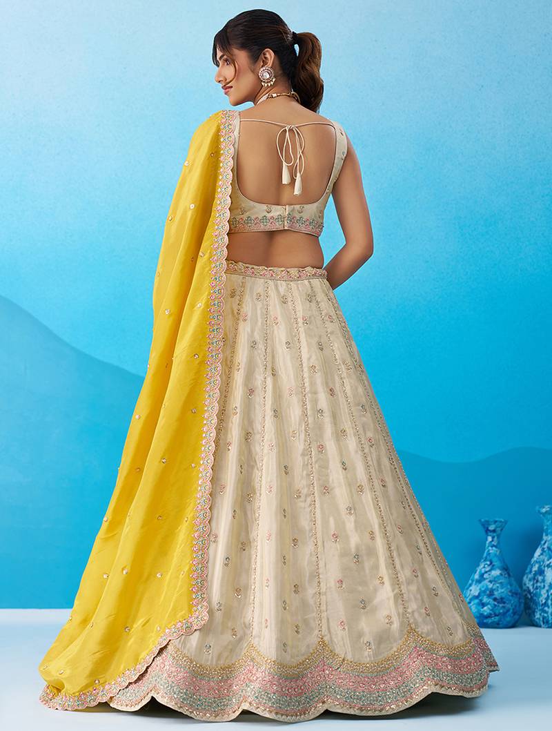 Cream- Tissue Sequins Embroidered Semi-Stitched Lehenga & Unstitched Blouse With Dupatta
