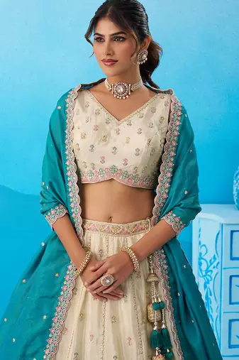 Cream- Tissue Sequins Embroidered Semi-Stitched Lehenga & Unstitched Blouse With Dupatta