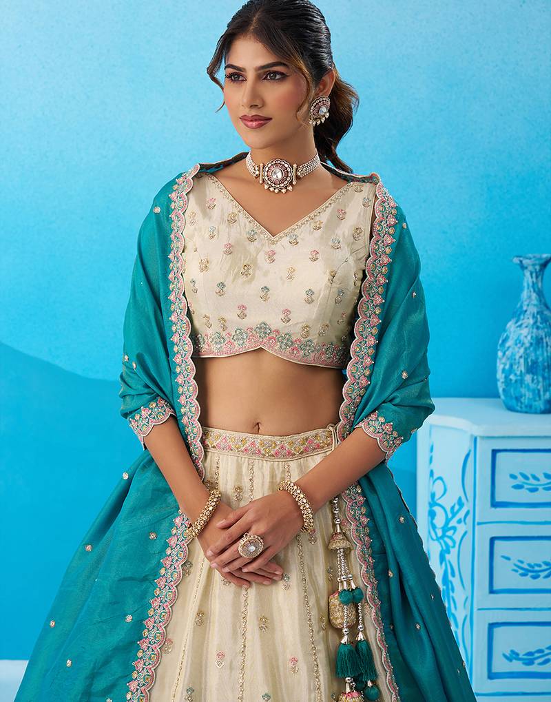 Cream- Tissue Sequins Embroidered Semi-Stitched Lehenga & Unstitched Blouse With Dupatta