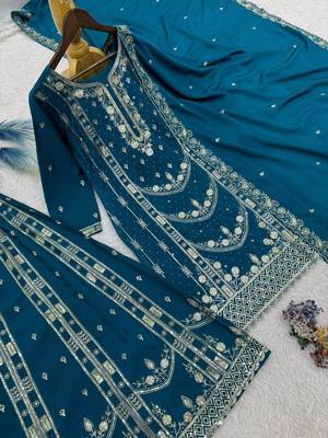 Teal blue embroidered suit 4