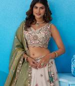 Cream- Tissue Sequins Embroidered Semi-Stitched Lehenga & Unstitched Blouse With Dupatta