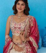 Cream- Tissue Sequins Embroidered Semi-Stitched Lehenga & Unstitched Blouse With Dupatta