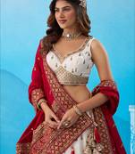 Cream- Chinnon Silk Sequinned Thread & Zari Embroidered Semi-Stitched Lehenga & Unstitched Blouse With Dupatta