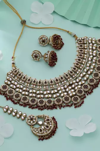 Maroon color kundan necklace set