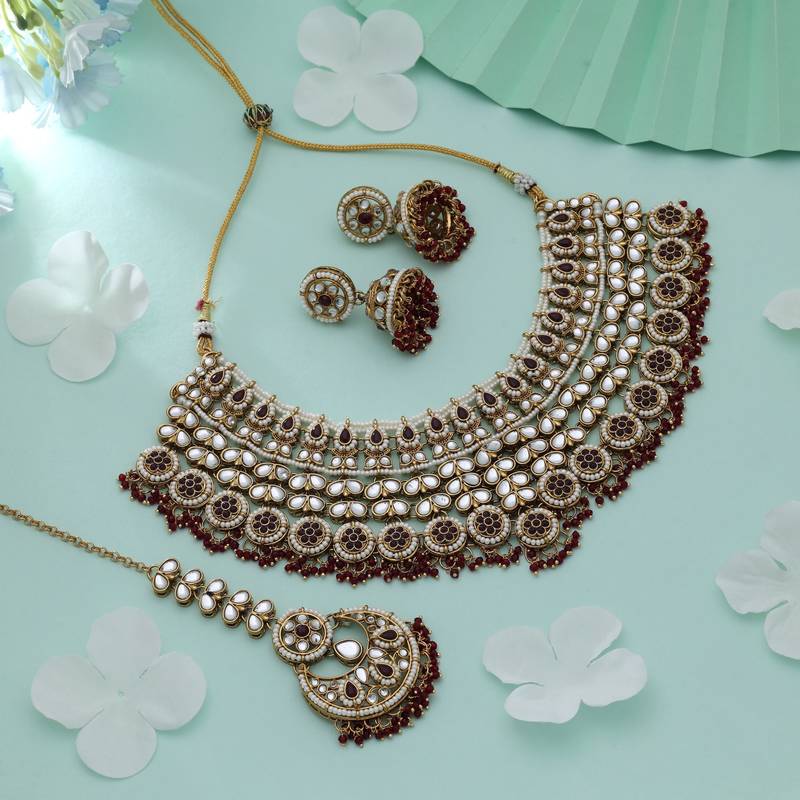 Maroon color kundan necklace set