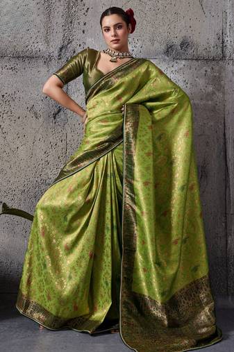 Parrot green exquisite premium kanjivaram silk saree with heavy jaal & kairi meenakari work