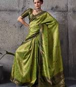 Parrot green exquisite premium kanjivaram silk saree with heavy jaal & kairi meenakari work