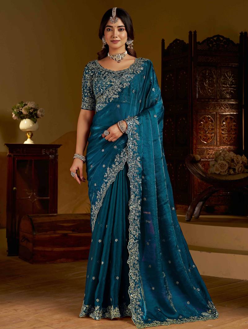 Rama colour satin silk saree with heavy embroidery work blouse