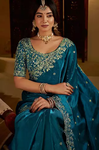 Rama colour satin silk saree with heavy embroidery work blouse