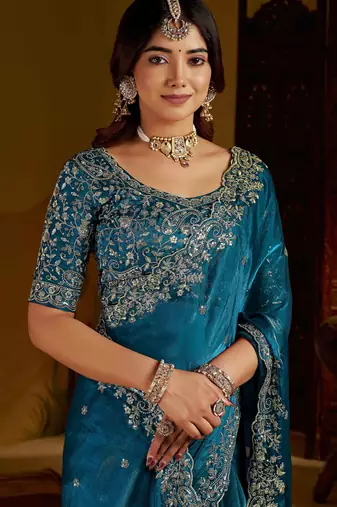 Rama colour satin silk saree with heavy embroidery work blouse