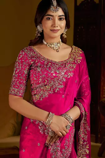 Rani colour satin silk saree with heavy embroidery work blouse