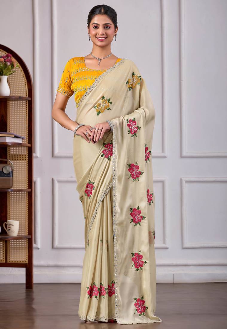 Beige rangoli saree with floral embroidery & mirror work