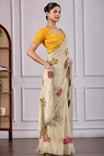 Beige rangoli saree with floral embroidery & mirror work