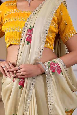 Beige rangoli saree with floral embroidery & mirror work 6