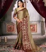trendy olive woven silk cotton bollywood saree with unstitched blouse