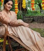 pure cream  self design art silk gift saree with unstitched blouse