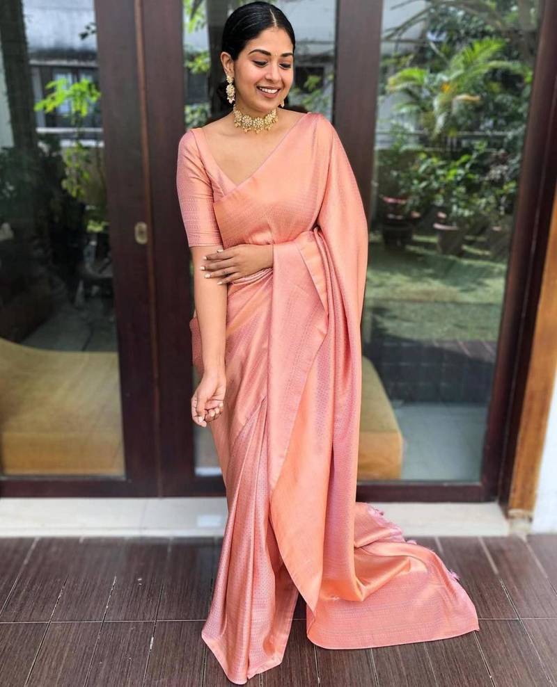 celebrity type peach self design south silk fancy saree with unstitched blouse
