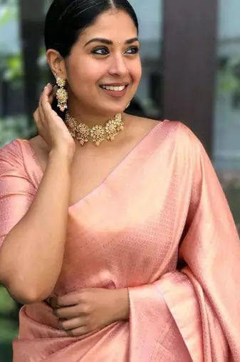 celebrity type peach self design south silk fancy saree with unstitched blouse