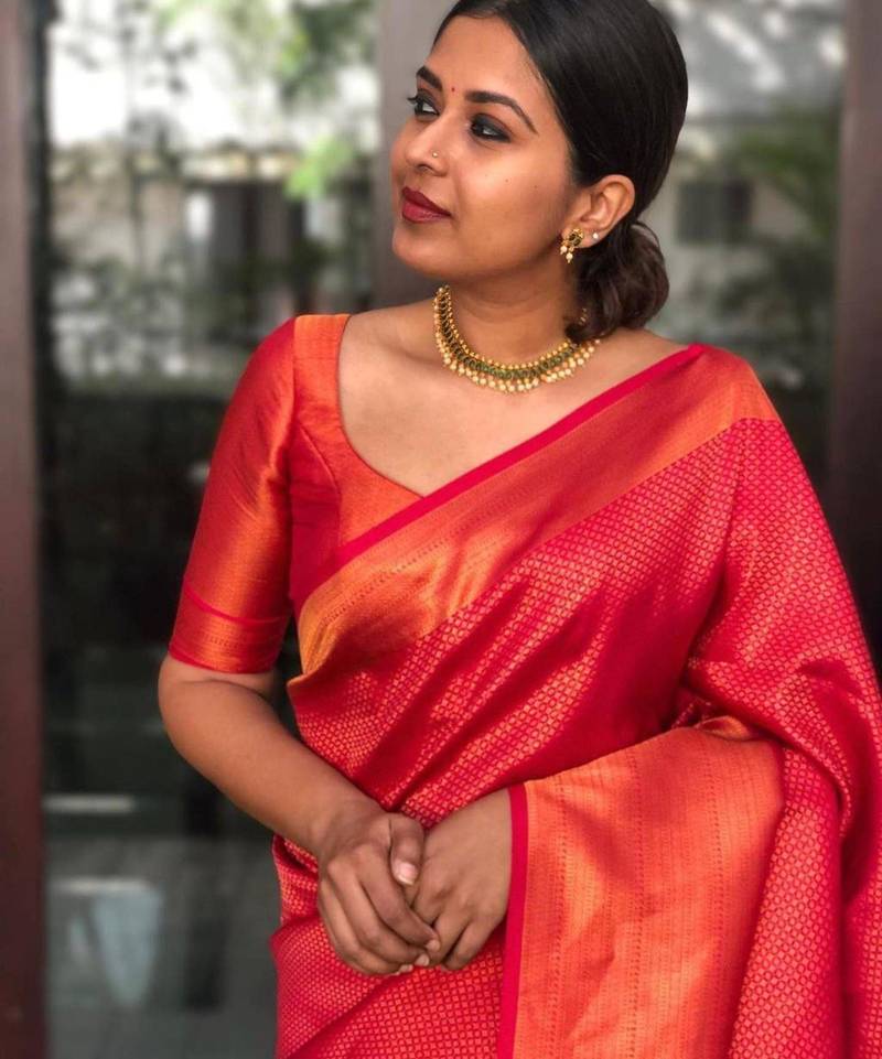 trendy light scarlet red banarasi art silk blend light weight saree with unstitched blouse