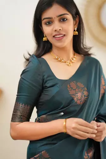 celebrity inspired rama green woven silk cotton saree with unstitched blouse