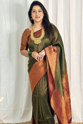embellished dark green self design silk cotton saree with unstitched blouse 1