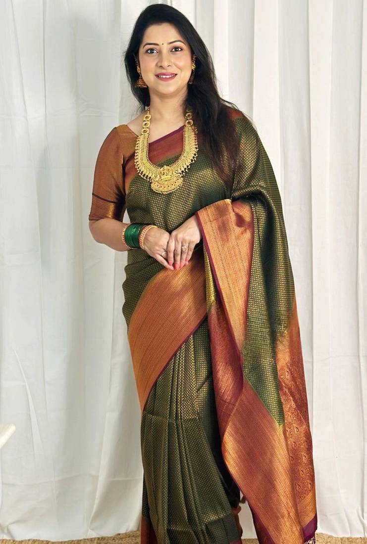 embellished dark green  self design silk cotton bollywood saree with unstitched blouse