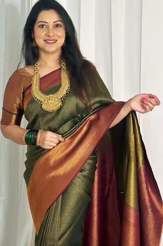 embellished dark green self design silk cotton saree with unstitched blouse